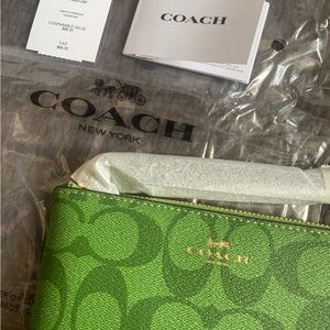 Beautiful green coach wristlet